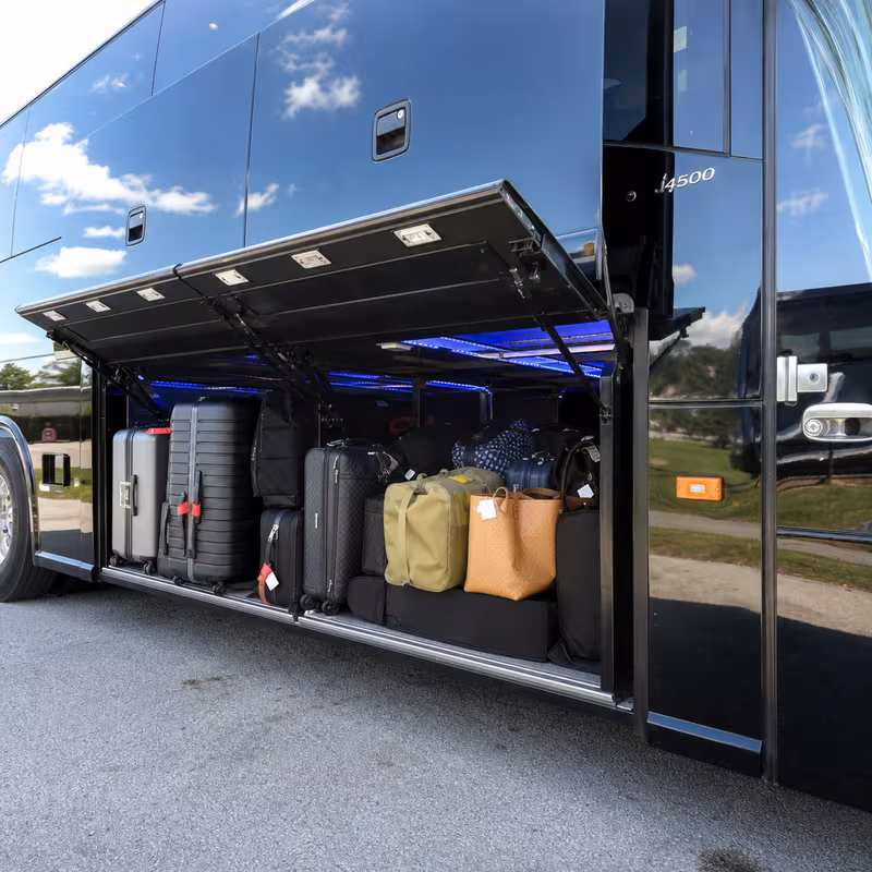 Party bus interior with wraparound leather seating and LED lighting in Memphis
