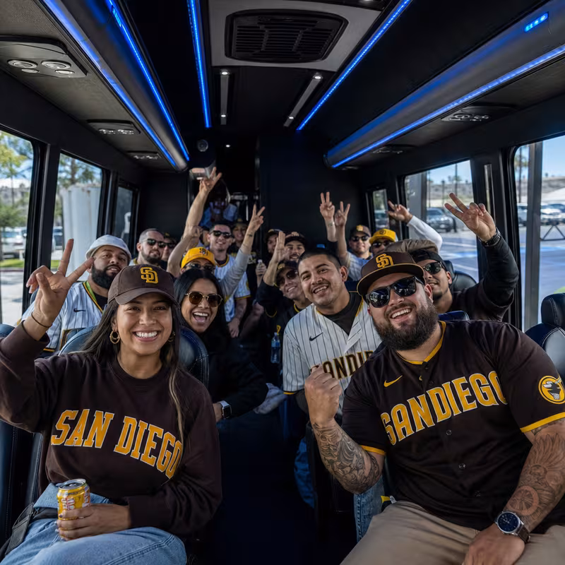Group boarding a white charter bus for Sporting Event Transportation transportation in Memphis