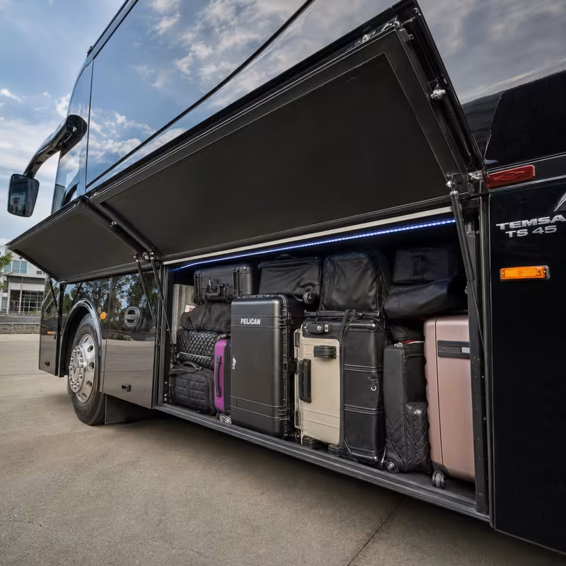 Party bus interior with wraparound leather seating and LED lighting in Memphis