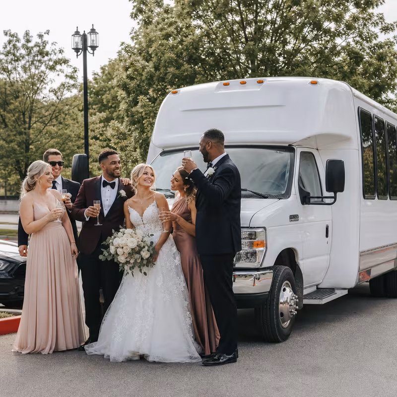 Passengers loading luggage while boarding an Memphis group shuttle