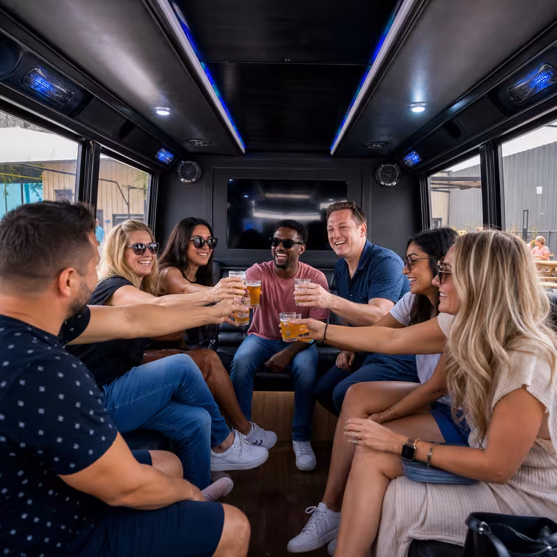 Group boarding a white charter bus for Winery & Brewery Tour Transportation transportation in Memphis